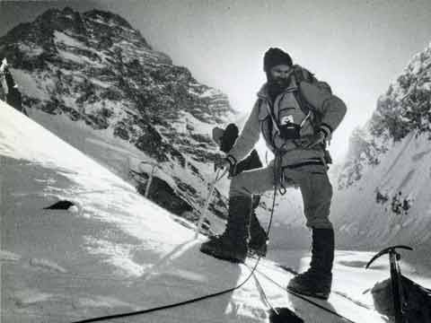 
Nick Estcourt on the way to Camp 1 at sunrise with K2 West Ridge behind in 1978 - Savage Arena book
